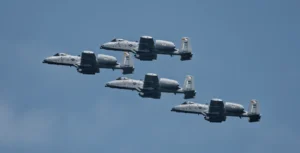 A flight of Maryland's own A-10C "Warthogs" close quarters as they approach the 2024 Ocean City Air Show.