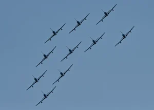 Precision flying as Italy's Frecce Tricolori initiate a pass at 2024's Ocean City Air Show.